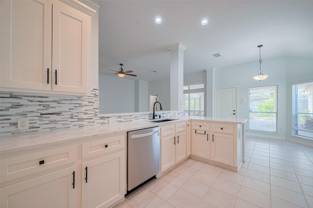 11607 Buck Springs Trl, Tomball, TX 77377 - kitchen featuring stainless steel dishwasher, decorative backsplash, ceiling fan, light tile patterned flooring, and hanging light fixtures