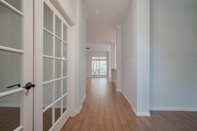 11607 Buck Springs Trl, Tomball, TX 77377 - hall with wood finished floors and baseboards