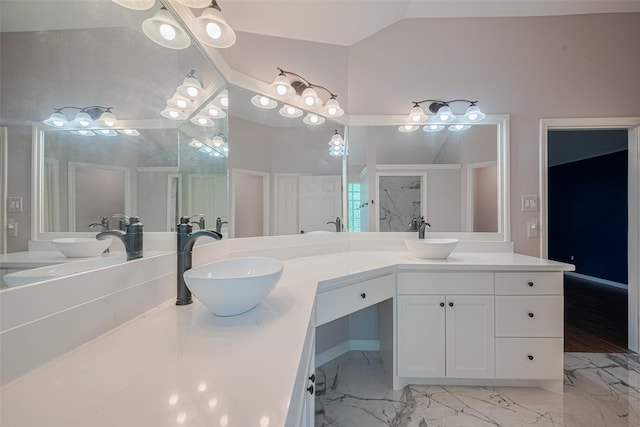 11607 Buck Springs Trl, Tomball, TX 77377 - bathroom featuring double vanity, vaulted ceiling, and marble finish flooring
