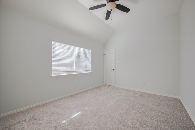 11607 Buck Springs Trl, Tomball, TX 77377 - unfurnished room featuring vaulted ceiling, a ceiling fan, and carpet flooring