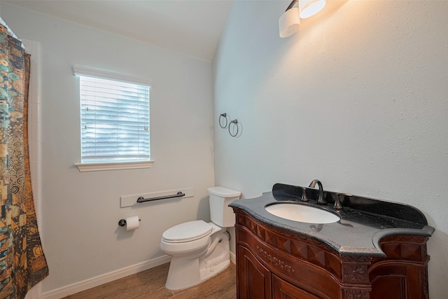 11607 Buck Springs Trl, Tomball, TX 77377 - bathroom featuring vanity, vaulted ceiling, wood finished floors, and a shower with curtain