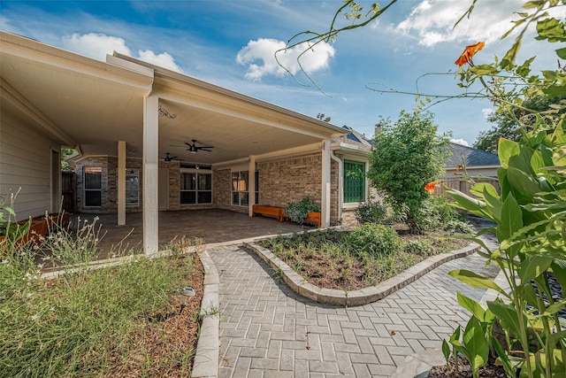 11607 Buck Springs Trl, Tomball, TX 77377 - view of patio / terrace with a ceiling fan