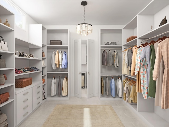 1002 E 25th St, Houston, TX 77009 - spacious closet featuring light tile patterned flooring and a chandelier