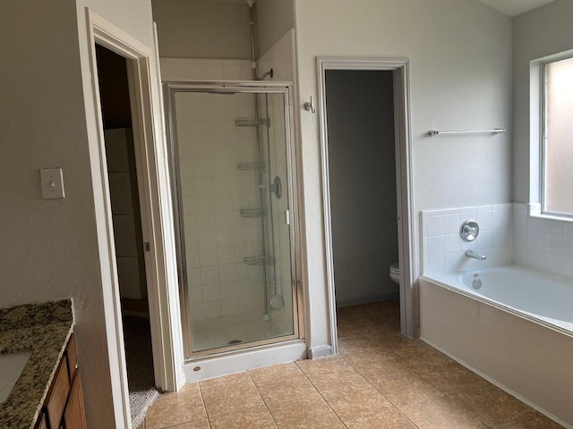 12610 Bethany Bay Dr, Pearland, TX 77584 - bathroom with a stall shower, a bath, vanity, and tile patterned floors