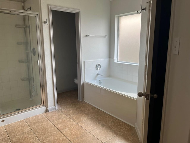 12610 Bethany Bay Dr, Pearland, TX 77584 - full bathroom featuring a stall shower, a garden tub, and tile patterned flooring