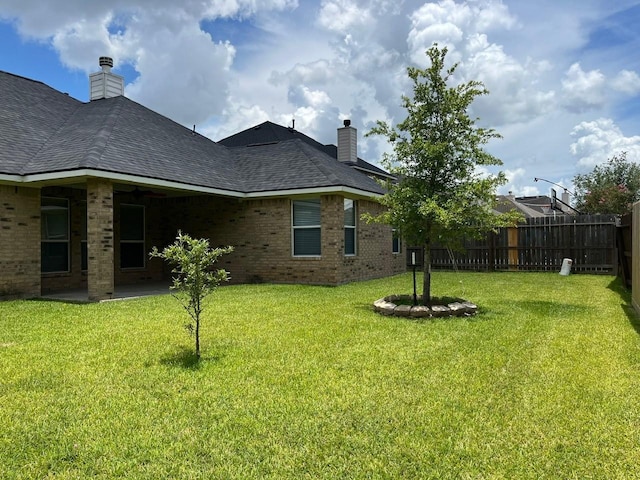 12610 Bethany Bay Dr, Pearland, TX 77584 - view of yard with a patio