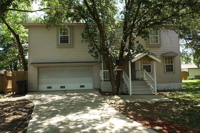 11822 Bandlon Dr, Houston, TX 77072 - traditional-style home with an attached garage and driveway