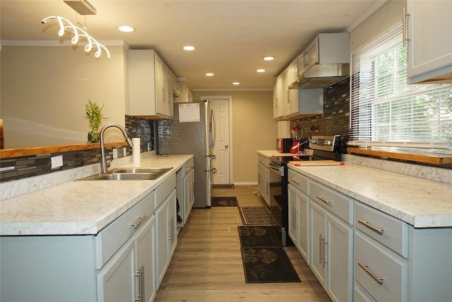 11822 Bandlon Dr, Houston, TX 77072 - kitchen with stainless steel electric stove, under cabinet range hood, ornamental molding, backsplash, and recessed lighting