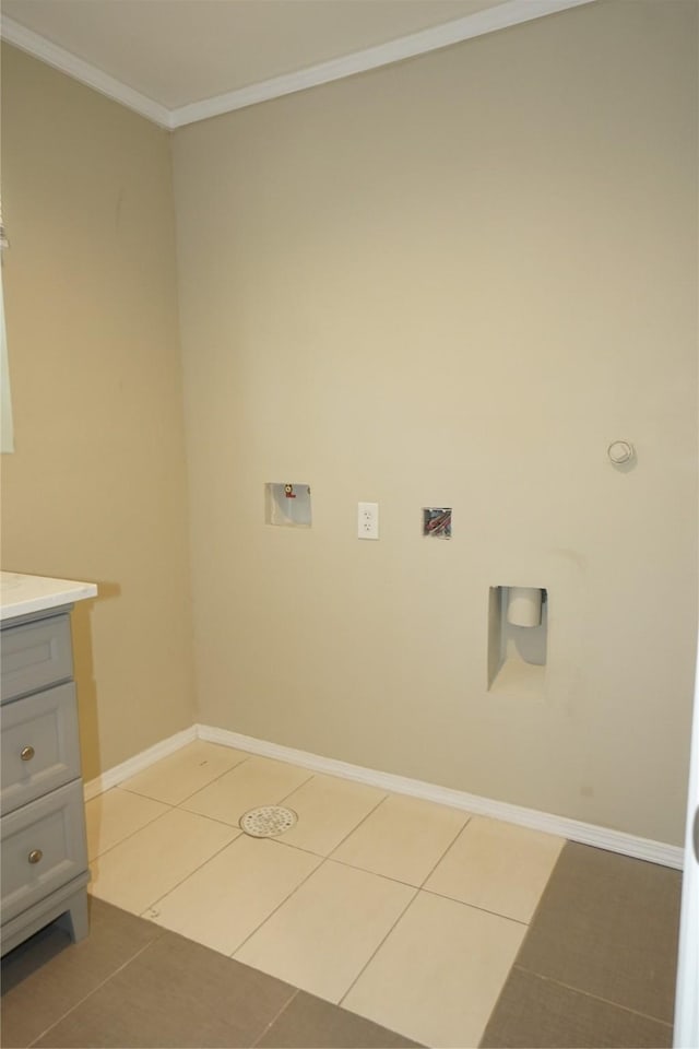 11822 Bandlon Dr, Houston, TX 77072 - laundry room with hookup for a washing machine, crown molding, and light tile patterned flooring