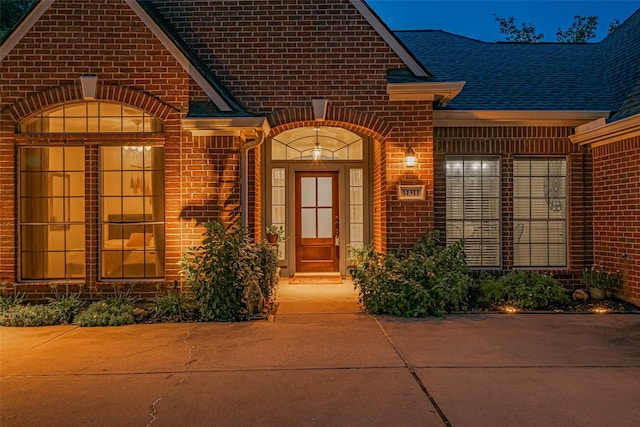 14311 Cally Cir, Needville, TX 77461 - doorway to property featuring brick siding