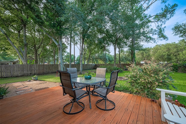 14311 Cally Cir, Needville, TX 77461 - wooden terrace featuring a fenced backyard and outdoor dining area