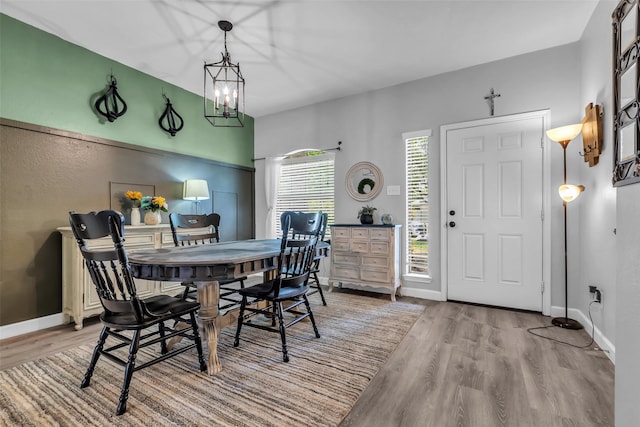 10211 Norway Spruce Ln, Tomball, TX 77375 - dining room featuring wood finished floors and baseboards