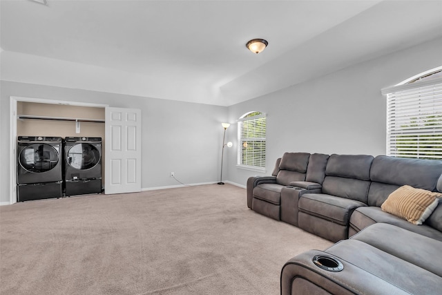 10211 Norway Spruce Ln, Tomball, TX 77375 - living area with washer and dryer and carpet flooring