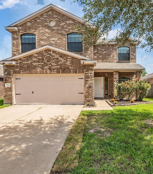 10211 Norway Spruce Ln, Tomball, TX 77375 - french country home with driveway, brick siding, a garage, and a front yard