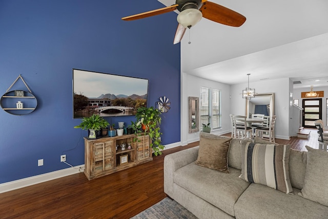 6006 Gilman Trace Ln, Houston, TX 77092 - living room featuring wood finished floors, ceiling fan, and a chandelier