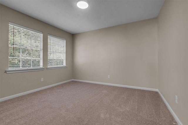 6415 Bayonne Dr, Spring, TX 77389 - carpeted empty room with baseboards