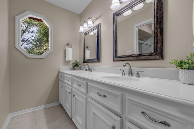 6415 Bayonne Dr, Spring, TX 77389 - full bathroom with double vanity and tile patterned floors