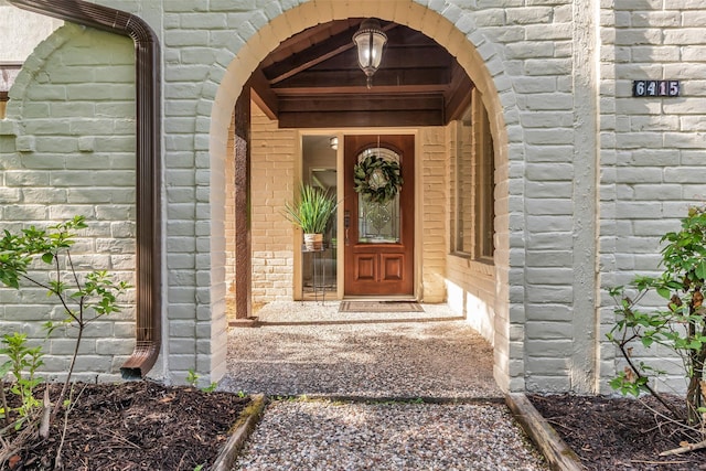 6415 Bayonne Dr, Spring, TX 77389 - doorway to property featuring brick siding