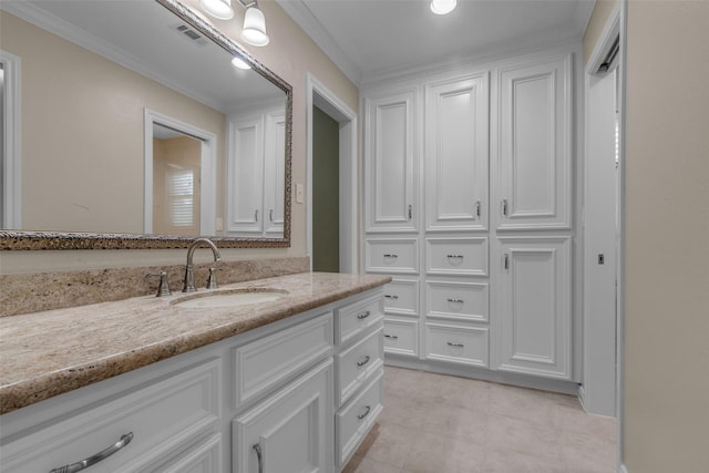 6415 Bayonne Dr, Spring, TX 77389 - bathroom with vanity, ornamental molding, tile patterned floors, and a closet