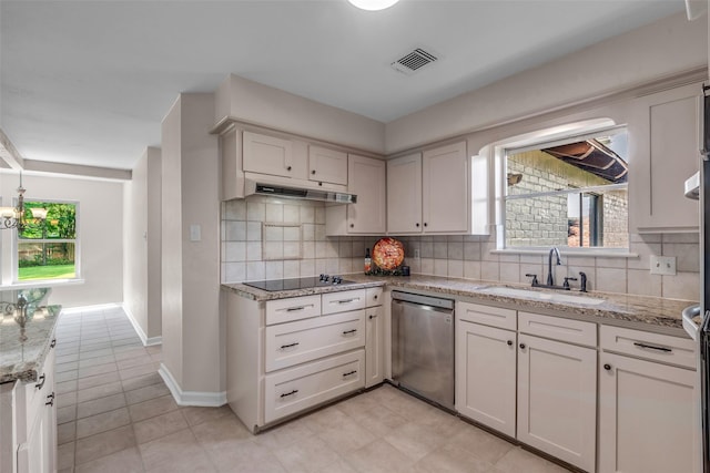 6415 Bayonne Dr, Spring, TX 77389 - kitchen with dishwasher, tasteful backsplash, black electric stovetop, and under cabinet range hood