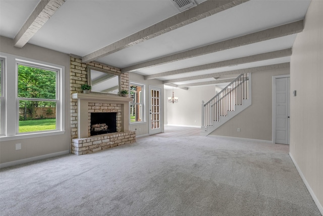 6415 Bayonne Dr, Spring, TX 77389 - unfurnished living room featuring carpet flooring, a brick fireplace, beam ceiling, stairway, and a chandelier