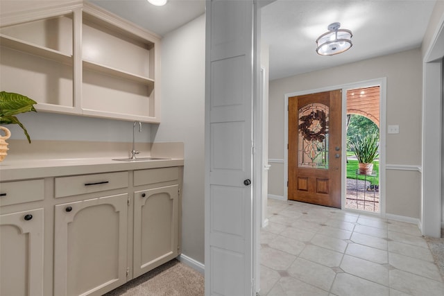 6415 Bayonne Dr, Spring, TX 77389 - foyer with baseboards and light tile patterned flooring