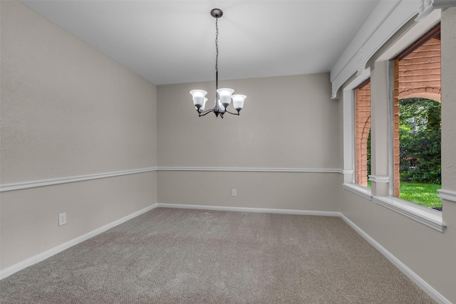 6415 Bayonne Dr, Spring, TX 77389 - spare room with carpet and a chandelier
