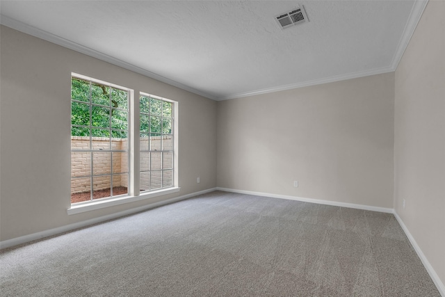 6415 Bayonne Dr, Spring, TX 77389 - carpeted empty room featuring ornamental molding, plenty of natural light, and a textured ceiling