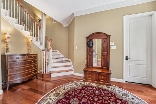 9114 Campbell Ct, Houston, TX 77055 - entrance foyer with wood finished floors, ornamental molding, and stairway