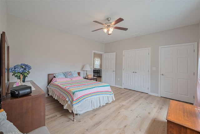 12118 Dumas St, Houston, TX 77034 - bedroom featuring wood finished floors, a ceiling fan, and a closet