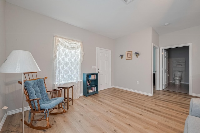 12118 Dumas St, Houston, TX 77034 - living area with light wood-type flooring and baseboards