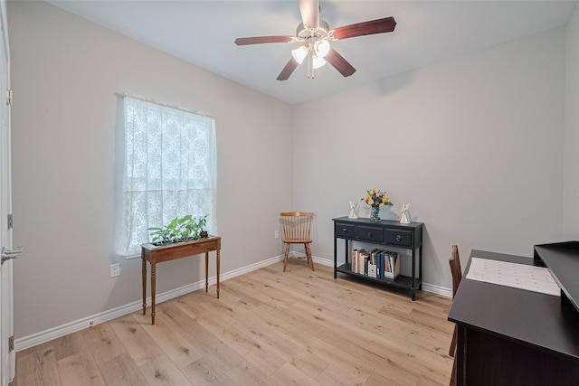 12118 Dumas St, Houston, TX 77034 - miscellaneous room with a ceiling fan, light wood-style floors, and an office area