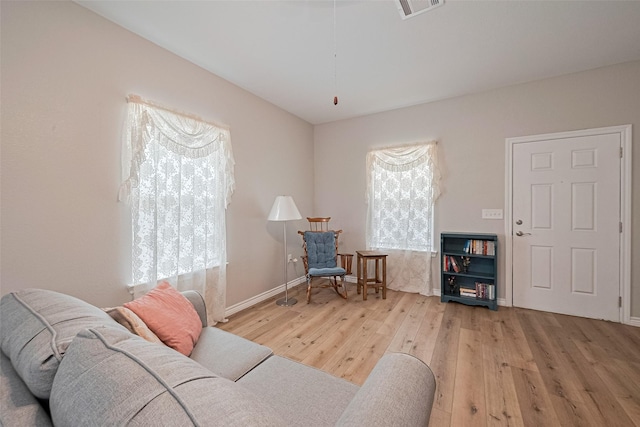 12118 Dumas St, Houston, TX 77034 - living area featuring hardwood / wood-style floors and baseboards