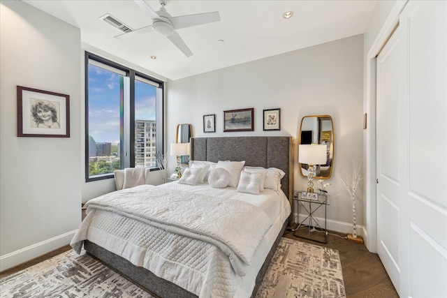 1409 Post Oak Blvd Unit 2204, Houston, TX 77056 - bedroom with a closet, wood finished floors, a ceiling fan, and recessed lighting