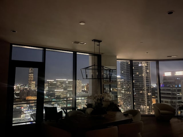 1409 Post Oak Blvd Unit 2204, Houston, TX 77056 - interior space featuring a wall of windows and a view of city lights