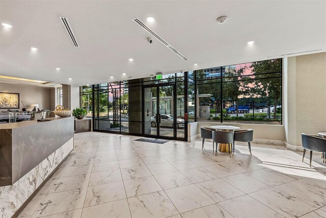 1409 Post Oak Blvd Unit 2204, Houston, TX 77056 - community lobby with recessed lighting and floor to ceiling windows