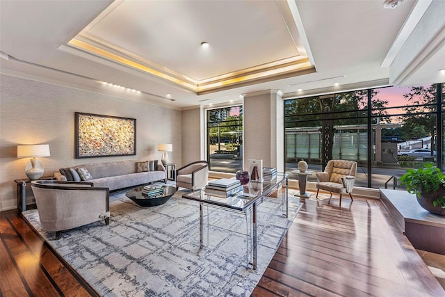 1409 Post Oak Blvd Unit 2204, Houston, TX 77056 - living room with a raised ceiling, wood-type flooring, and crown molding