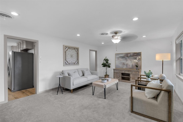 2934 Robertson St, Houston, TX 77009 - living room featuring recessed lighting, ceiling fan, and light colored carpet
