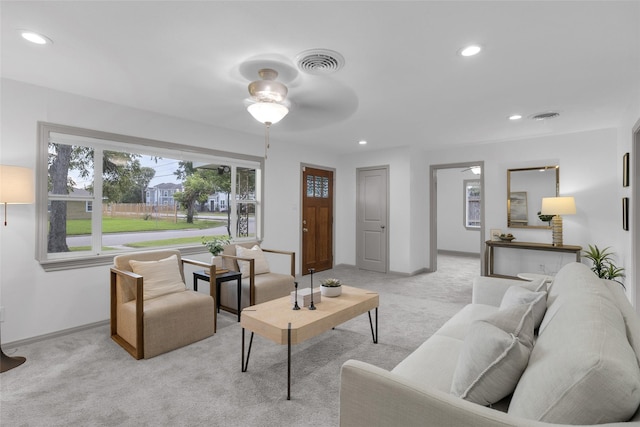 2934 Robertson St, Houston, TX 77009 - living room with light carpet, a ceiling fan, healthy amount of natural light, and recessed lighting