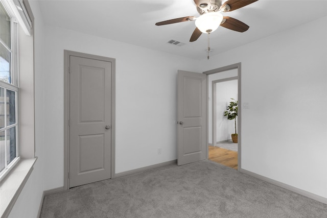 2934 Robertson St, Houston, TX 77009 - unfurnished bedroom with carpet and a ceiling fan