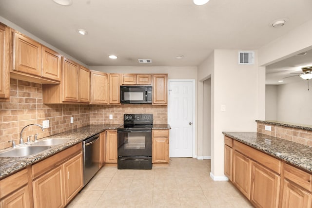 3502 Quail Meadow Dr, Missouri City, TX 77459 - kitchen with black appliances, light tile patterned flooring, decorative backsplash, dark stone countertops, and recessed lighting