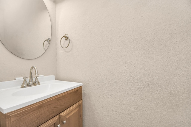 3502 Quail Meadow Dr, Missouri City, TX 77459 - bathroom with vanity and a textured wall