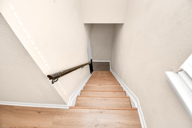 3502 Quail Meadow Dr, Missouri City, TX 77459 - staircase featuring wood finished floors and baseboards