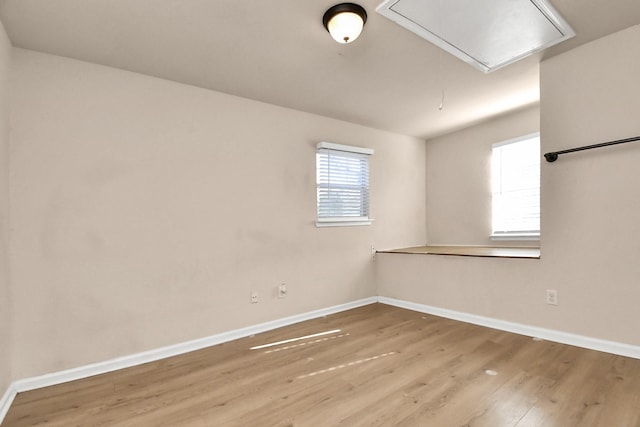 3502 Quail Meadow Dr, Missouri City, TX 77459 - unfurnished room with attic access and wood finished floors