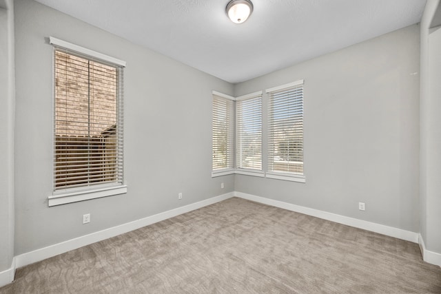 13207 Terania Cliff Trce, Houston, TX 77059 - empty room featuring baseboards and carpet floors