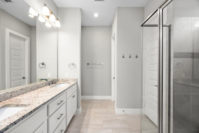 13207 Terania Cliff Trce, Houston, TX 77059 - full bathroom with double vanity, a shower stall, and recessed lighting