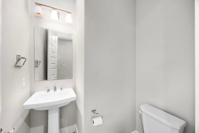 13207 Terania Cliff Trce, Houston, TX 77059 - bathroom with toilet and a sink