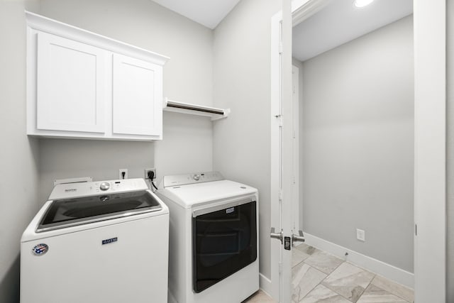 13207 Terania Cliff Trce, Houston, TX 77059 - laundry area featuring cabinet space and independent washer and dryer