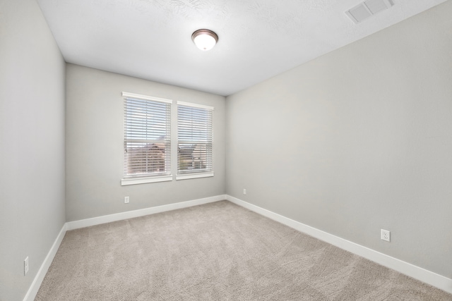 13207 Terania Cliff Trce, Houston, TX 77059 - carpeted spare room featuring baseboards