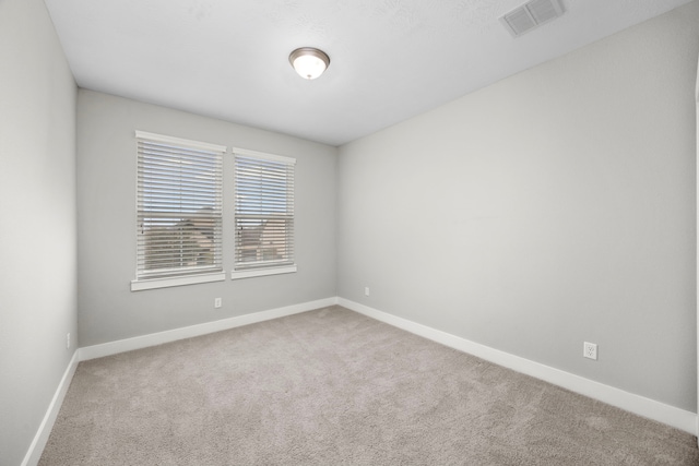 13207 Terania Cliff Trce, Houston, TX 77059 - spare room featuring carpet and baseboards